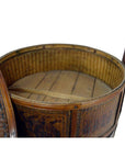 Brown wooden Chinese large wedding basket with lid, two upright handles, and sturdy base, close-up view.