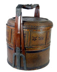 Brown wooden Chinese wedding basket with large handle and intricate patterns, shown in overall good condition.