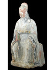 Terracotta Ming Dynasty court figure statuette with draped clothing, brown color, close-up on black background.