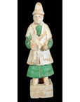 Green terracotta Ming Dynasty court figure in robes and hat on rectangular base, close-up.