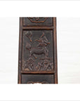 Brown elmwood panel with carved prancing deer, grass, and floating orb, from Chinese Ming Dynasty chair.
