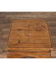 Brown wooden incense stand with cabriole legs, Ming style, on wood-patterned floor indoors.
