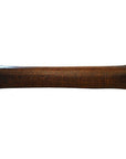 Brown leather Chinese opium pillow, long rectangular bolster with textured surface, against a white background.