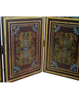 Gold, blue, and red floral patterned vintage double sided 4-panel divider with ornate borders used as privacy screen.