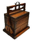 Vintage wooden Chinese picnic box writing desk with metal accents, compartments, and handles on display.