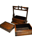 Brown wooden Chinese picnic boxes, one with a carved handle, two open with lids beside them on a flat surface.