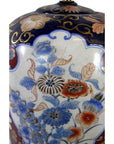 Blue, red, and gold porcelain lamp with floral patterns and ornate motifs, electric, shown in good condition.