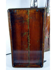 Red lacquered Chinese Shandong wedding box with bamboo accents, glossy finish, and raised edges showing visible wear.