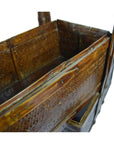 Close-up of a rectangular Chinese wedding box with brown wooden frame, rattan weave, and hinged lid.