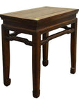 Dark wood Chinese side table with four straight legs and slightly raised rectangular top, studio background.