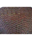 Close-up of brown woven texture with diamond pattern on Chinese storage basket.