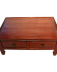 Reddish wood Chinese low Kang coffee table with two front drawers and round metal handles, front view.