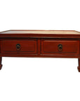 Reddish-brown wood Chinese Low Kang coffee table with two drawers and round metal handles, front view.