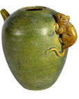 Close-up of green ceramic Chinese water dropper with small brown mouse figurine, left spout, and missing top.