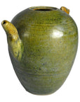 Green glazed ceramic Chinese water dropper with round body, two short curved side spouts, and missing top.