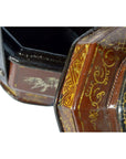 Close-up of a red and gold Chinese wedding basket with ornate lacquer and intricate detailing.