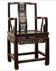 Dark wood Chinese wedding chair with curvy pierced splat and serpentine arms, traditional style, close-up view.