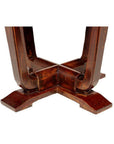 Close-up of natural wood Chinese Elmwood base with X-shaped support on circular side table.