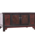 Red and black lacquer coffee table with floral designs, 2 doors, and short legs, front view.