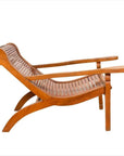 Brown wood lounge chair with curved seat and slatted design, side view on a white background.