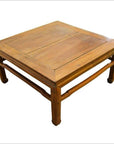 Light brown elm wood coffee table with simple design and sturdy legs, shown against a plain white background.