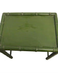 Green bamboo side table with rectangular top and bamboo-style legs on white background.
