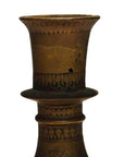 Silver hammered metal Indian urn with engraved patterns, close-up against a plain white background.