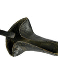 Brown wood hand-carved Indian Saringda lute with hollow body and rectangular handle, close-up.