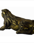 Brown wood hand-carved Indonesian beast figure reclining, head turned, tail missing, visible cracks, used condition.