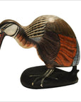 Gray hand-carved wood kiwi bird with black base, close-up.