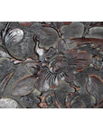 Dark rosewood wall plaque, hand-carved and lacquered, with bird motif, inspired by 19th-century Chinese decor.