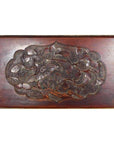 Dark rosewood Chinese wall plaque, 19th century, hand-carved and lacquered with bird and ornate floral designs.