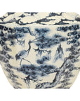 Blue and white porcelain vase with hand painted crane and pine tree design in classic Asian style.