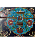 Colorful hand-painted wooden dowry box with gold floral and phoenix designs, close-up of decorative lock plate.