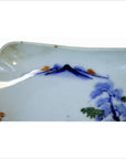 Close-up of blue, green, and orange hand painted Imari Meiji porcelain bowl with landscape design; fits 6" box.