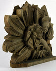 Brown wood hand-carved temple plaque with large floral and leaf designs, close-up view, 9.5 x 8.5 x 1 inches.