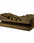 Brown wooden hand-carved temple plaque with intricate floral patterns, 10.5" block for textile printing, close-up.