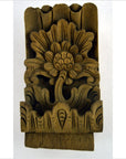 Brown wood hand-carved temple plaque with intricate floral design, 10.5", close-up, in good condition.