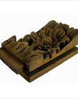 Brown hand-carved wooden temple plaque with intricate floral design, close-up view, 10.5 inches.