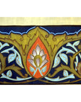 Blue and gold silk tapestry with ornate floral pattern, central lotus, and border design.