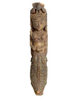 Close-up of an Indian antique polychrome wood statue of a celestial musician with ornate, vibrant painted details.