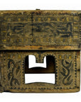 Brown carved wooden Indian betel nut box with animal and floral patterns, close-up, on plain background.