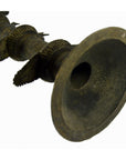 Close-up of brass Indian oil burner with flared 5 1/4 inch bell and decorative rings on the body.