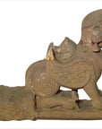 Side view of a gray stone Indian sphinx sculpture from the 19th century with tiara and earrings, hand-carved.