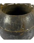 Close-up of an Indian iron water jug with handle, vintage style, used as a vase for home decor.