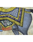 Close-up of colorful Indian Royal Horse Tapestry showing detailed gold patterns and ornate textile decorations.