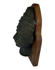 Brass Indian temple bas-relief plaque, side view, 8x4x1.5", mounted on wooden base, very good condition.