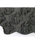 Close-up of brown wooden Indian ink block with repeating floral pattern, 7-inch size, in good condition.