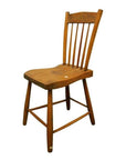 Brown wooden Indonesian chair with slatted backrest and four legs, photographed against a plain white background.
