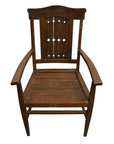 Brown wooden vintage armchair with high back and diamond cut-out pattern on the back panel, Indonesian Java style.